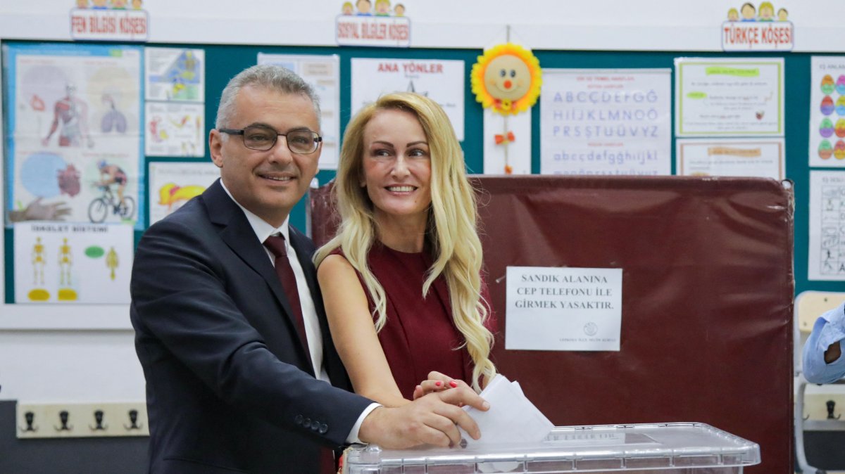 Republican Turkish Party leader Tufan Erhürman and his wife Nilden Erhürman cast their ballots at a polling station, Lefkoşa (Nicosia), TRNC, Oct. 19, 2025. (AFP Photo)