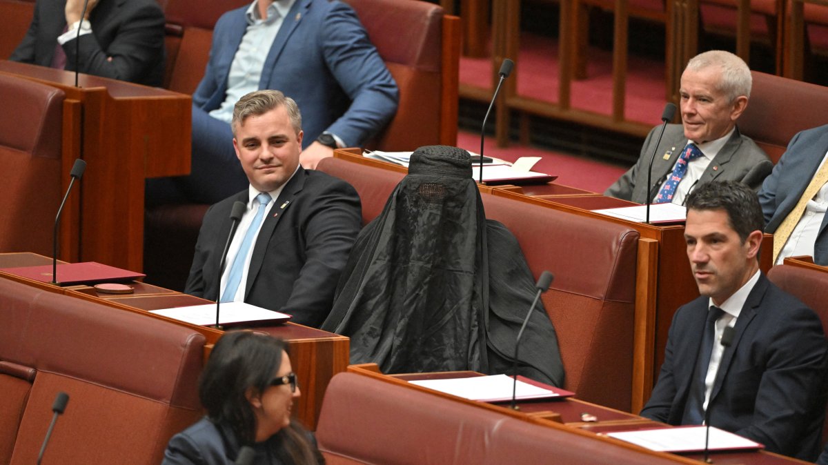 One Nation Leader Pauline Hanson wears a burqa in the Senate chamber at Parliament House in Canberra, Australia, Nov. 24, 2025. (Reuters Photo)