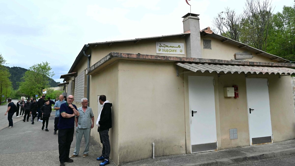 People stand outside a mosque in La Grand-Combe, southern France, April 27, 2025. (AFP Photo)