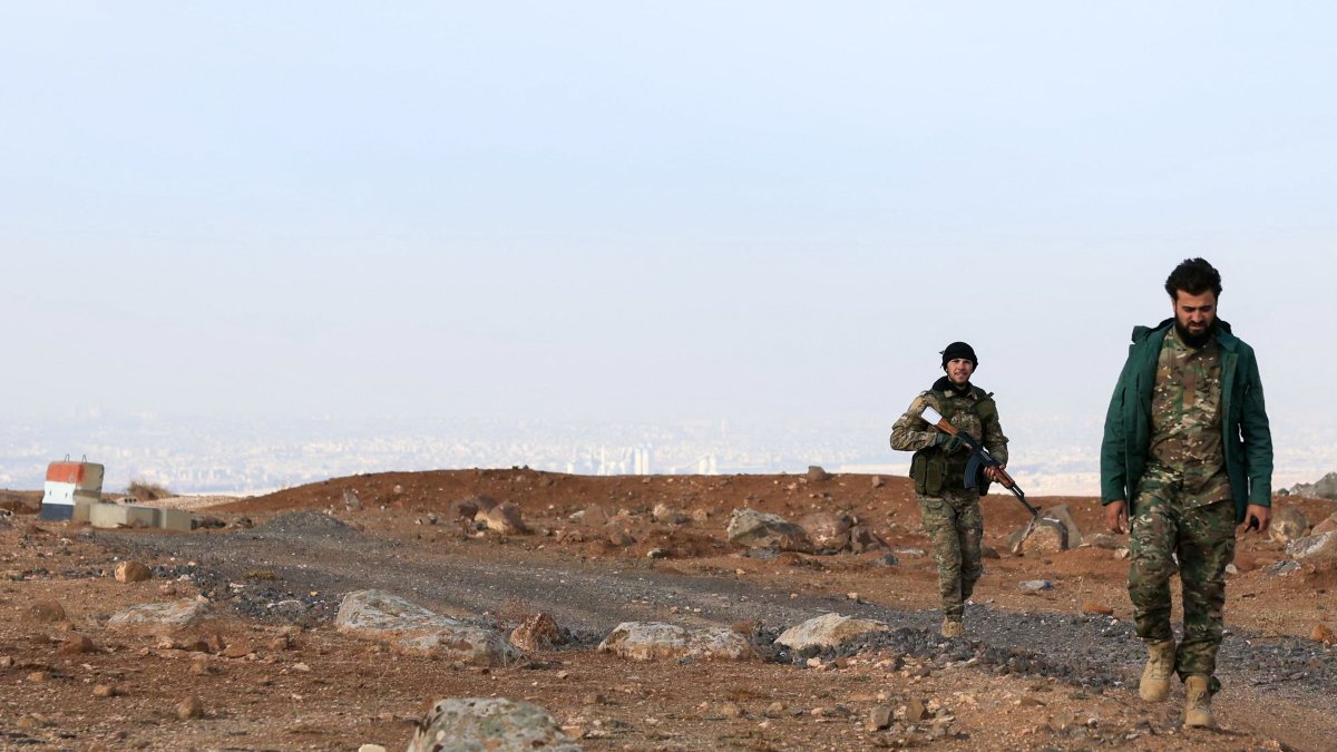 Soldiers from the Syrian Ministry of Defense tour an abandoned military base, once considered to be the largest Iranian military base in Syria, on the southern outskirts of Aleppo, in the Jabal Azzan area, Dec. 4, 2025. (AFP File Photo)