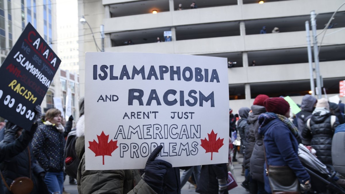 People with posters rejecting racism and Islamophobia during a rally in Toronto, Canada, Feb. 4, 2017. (Shutterstock File Photo)