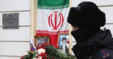 A Russian police officer patrols in front of a makeshift memorial featuring a portrait of the late Iranian Supreme Leader Ayatollah Ali Khamenei near the Iranian Embassy, Moscow, Russia, March 2, 2026. (EPA Photo)