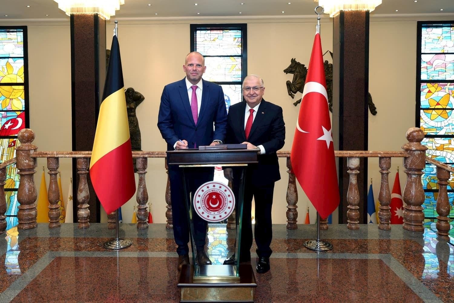 This handout photograph taken and released by the Defense Ministry shows Defense Minister Yaşar Güler (R) and Belgium's Defense and Foreign Trade Minister Theo Francken posing ahead of their meeting, Ankara, Türkiye, May 13, 2026. (AFP Photo)