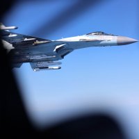 A handout picture released by Britain's Ministry of Defence (MOD) in London on May 20, 2026 shows Image of a Russian Su-35, seen here alongside an RAF Rivet Joint aircraft over the Black Sea in April 2026. (AFP Photo)