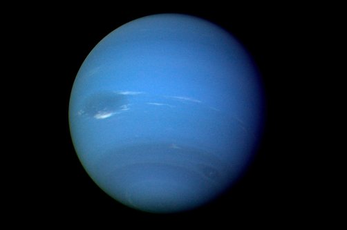This image, provided by NASA, shows the planet Neptune photographed by the Voyager 2 spacecraft, processed to enhance the visibility of small features, August 1989. (AP Photo)