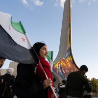 Syrians gather at the city center to celebrate one year since the fall of the Assad regime, Damascus, Syria, Dec. 7, 2025. (Getty Images Photo)